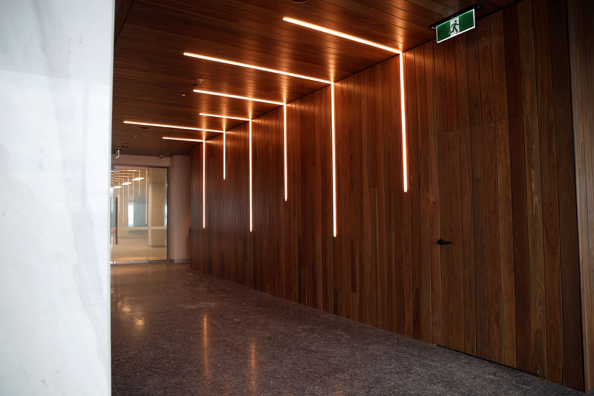 Upper level lift lobby in timber panelling